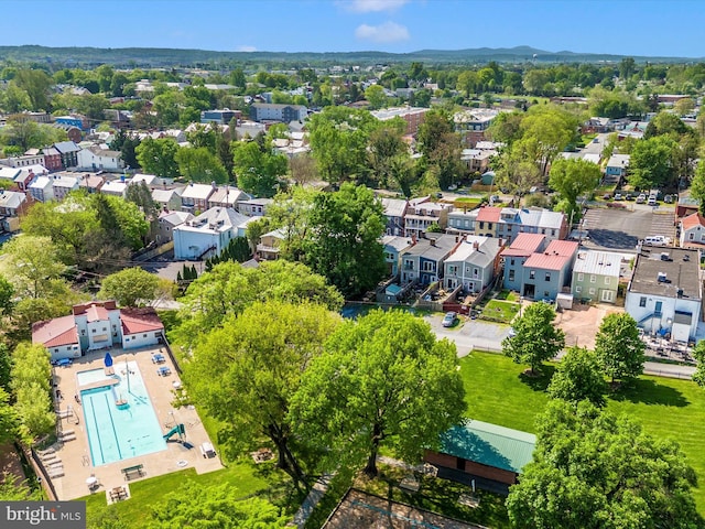 aerial view of residential area featuring a pool