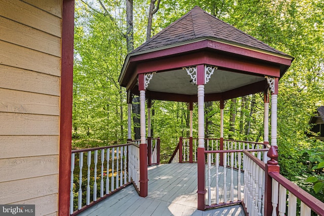 wooden terrace with a gazebo
