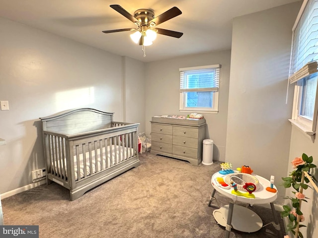 918 Hillside Ave, Upper Chichester, PA 19061 - bedroom with baseboards, carpet, ceiling fan, and a crib