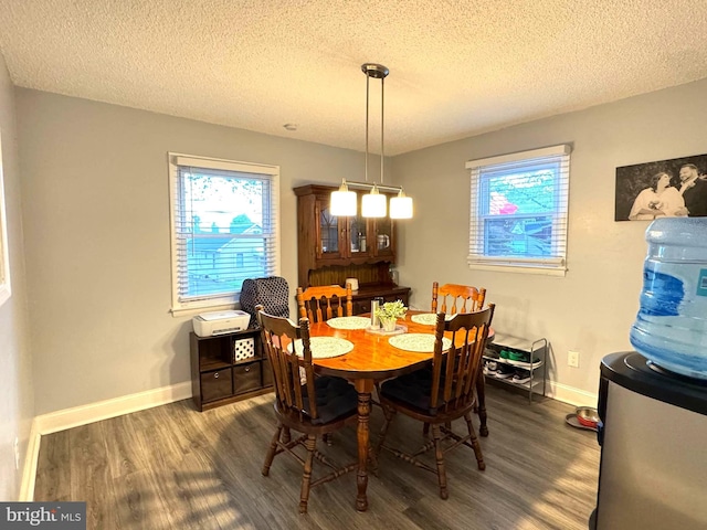918 Hillside Ave, Upper Chichester, PA 19061 - dining area with baseboards, a textured ceiling, and wood finished floors