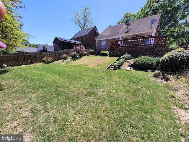 view of yard with a deck