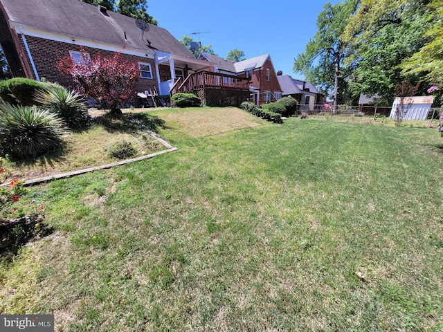 view of yard featuring a deck
