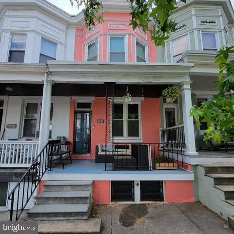 view of exterior entry featuring a porch