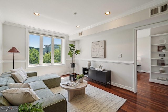 living area featuring visible vents, recessed lighting, baseboards, and wood finished floors