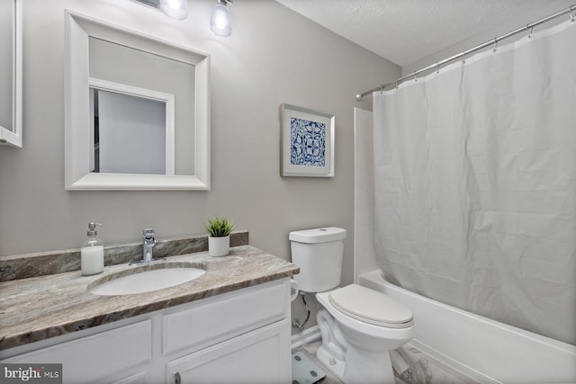 4006 Enders Ln, Bowie, MD 20716 - bathroom featuring vanity, toilet, shower / bath combo, a textured ceiling, and baseboards