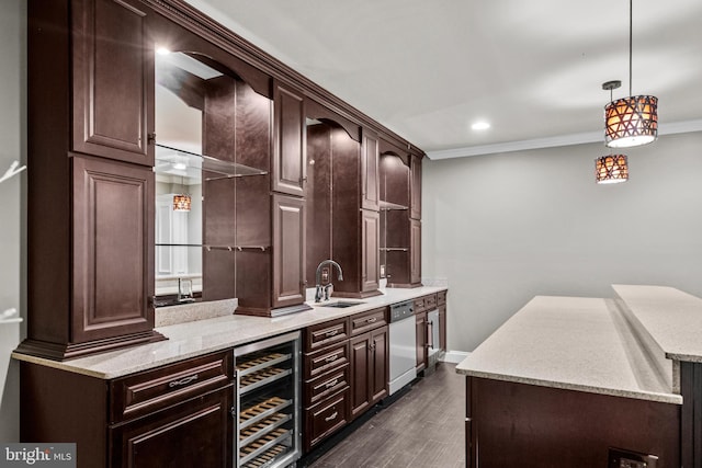 bar featuring stainless steel dishwasher, dark wood-style flooring, beverage cooler, indoor wet bar, and a sink