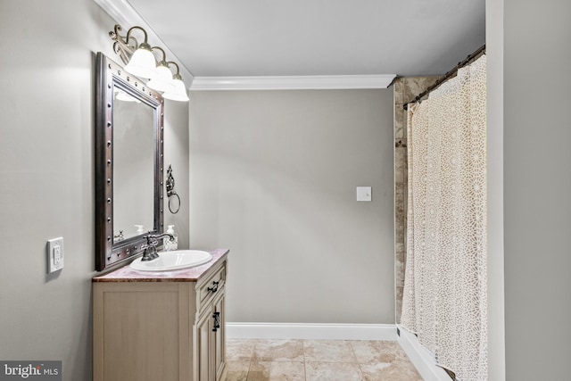 full bathroom with vanity, ornamental molding, and baseboards