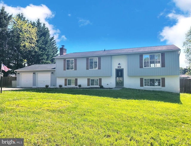 1640 Kreitler Valley Rd, Forest Hill, MD 21050 - raised ranch with a chimney, an attached garage, fence, and a front yard