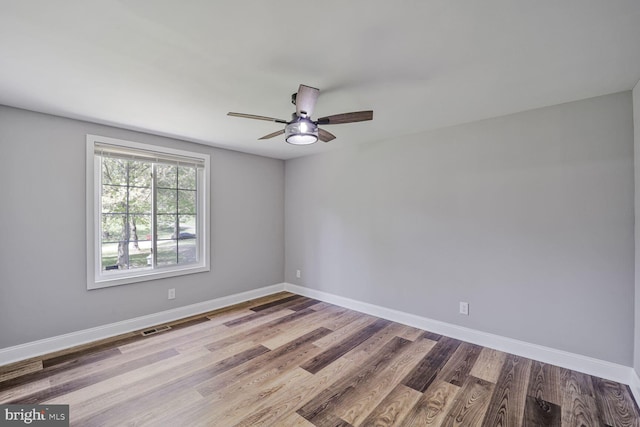 1640 Kreitler Valley Rd, Forest Hill, MD 21050 - unfurnished room with visible vents, baseboards, ceiling fan, and wood finished floors