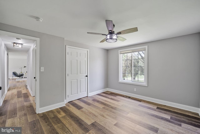 1640 Kreitler Valley Rd, Forest Hill, MD 21050 - unfurnished bedroom featuring ceiling fan, baseboards, visible vents, and wood finished floors