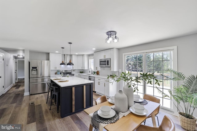1640 Kreitler Valley Rd, Forest Hill, MD 21050 - kitchen with a center island, tasteful backsplash, a sink, an inviting chandelier, and stainless steel appliances
