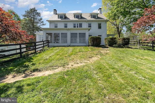 403 E Fourth St, Waynesboro, PA 17268 - back of property with fence, a chimney, and a yard