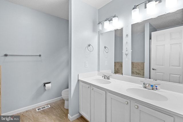 806 Windy Way, Front Royal, VA 22630 - full bath featuring toilet, double vanity, and baseboards