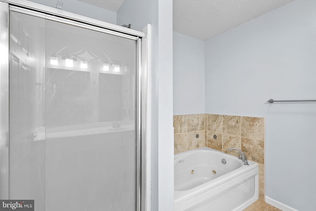 806 Windy Way, Front Royal, VA 22630 - full bath featuring a whirlpool tub, a textured ceiling, and a stall shower