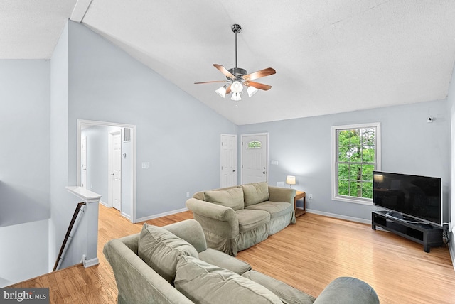 806 Windy Way, Front Royal, VA 22630 - living area with vaulted ceiling, ceiling fan, light wood-style floors, baseboards, and a textured ceiling