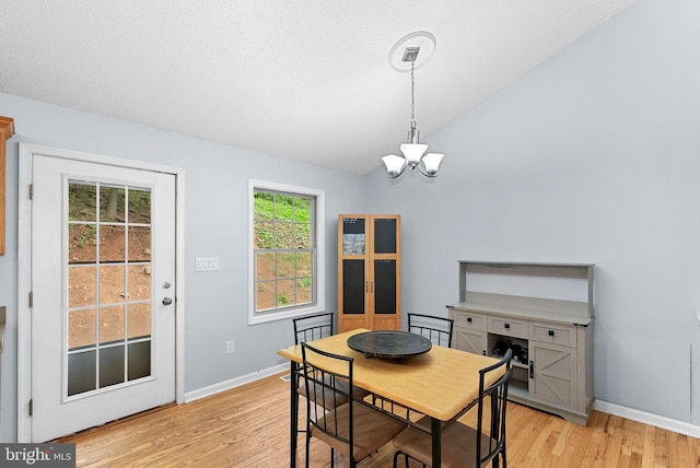 806 Windy Way, Front Royal, VA 22630 - dining space featuring a chandelier, light wood-type flooring, vaulted ceiling, and baseboards