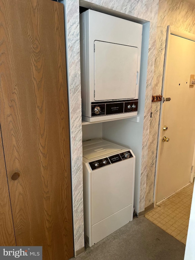 12304 Jamaica Ave Unit 206, Ocean City, MD 21842 - clothes washing area with laundry area and stacked washer / dryer