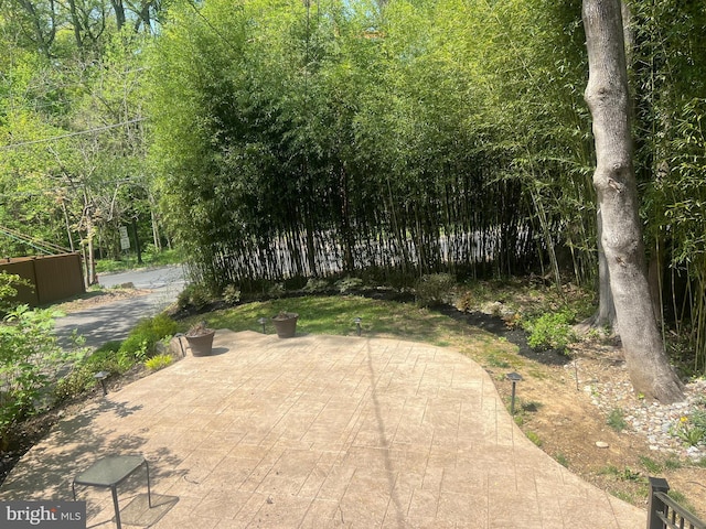view of property's community with a patio