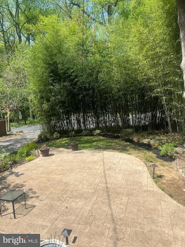 view of property's community featuring a patio