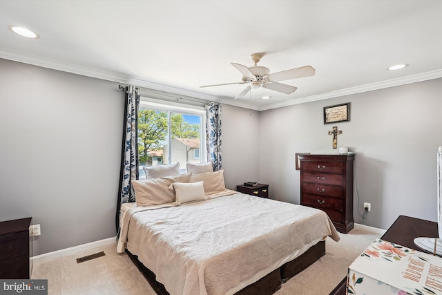 bedroom with light colored carpet, recessed lighting, and baseboards