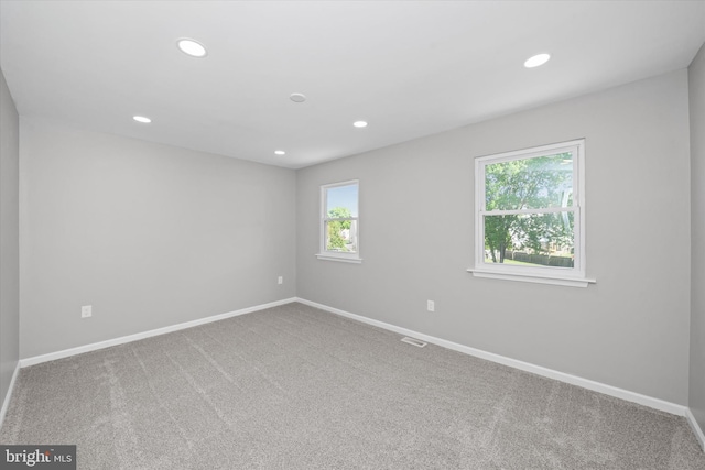 13 Sumac Ct, Newark, DE 19702 - carpeted empty room with baseboards, recessed lighting, and visible vents