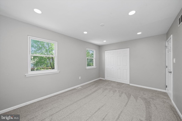 13 Sumac Ct, Newark, DE 19702 - unfurnished bedroom with visible vents, baseboards, carpet floors, a closet, and recessed lighting