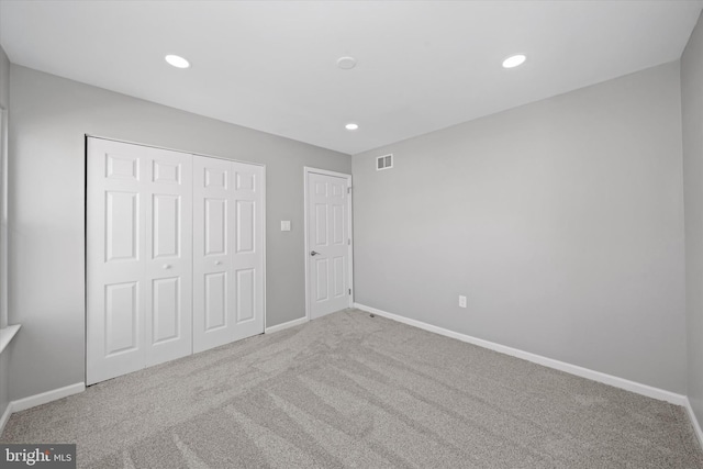 13 Sumac Ct, Newark, DE 19702 - unfurnished bedroom with visible vents, carpet flooring, baseboards, and a closet