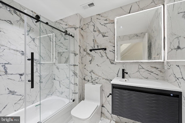 2230 Kimball St, Philadelphia, PA 19146 - bathroom featuring tile walls, enclosed tub / shower combo, toilet, and vanity