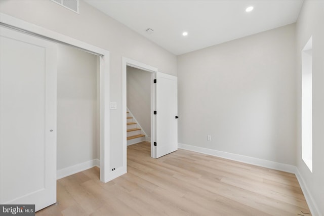 2230 Kimball St, Philadelphia, PA 19146 - unfurnished bedroom with light wood-style flooring, recessed lighting, baseboards, and a closet