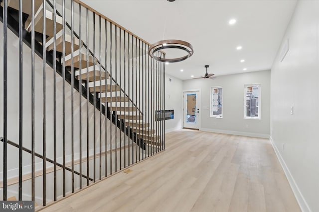 2230 Kimball St, Philadelphia, PA 19146 - stairway with wood finished floors, recessed lighting, baseboards, and ceiling fan