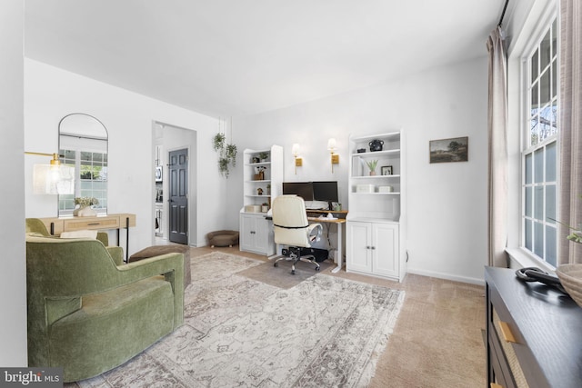 view of carpeted office space