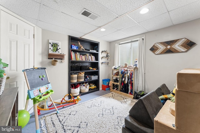 rec room featuring recessed lighting, visible vents, and a drop ceiling