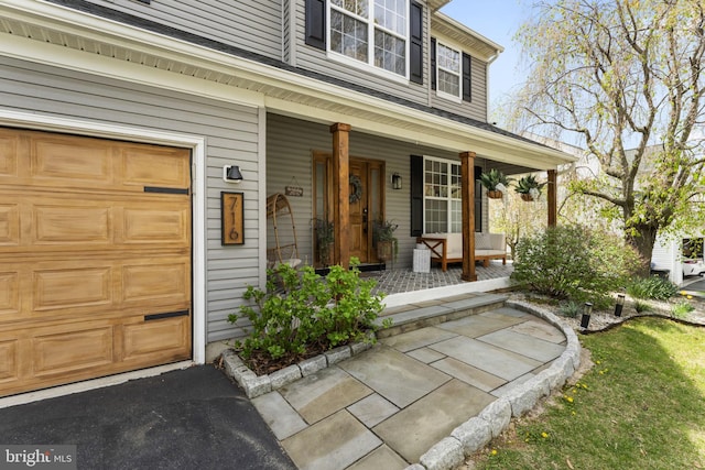entrance to property with a porch