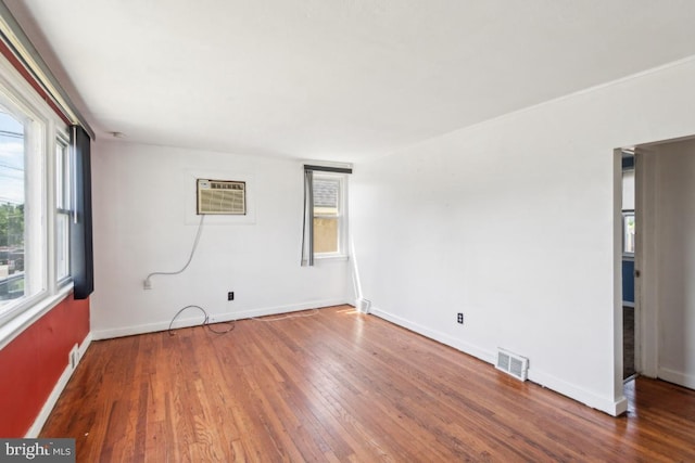 8 Sullivan Ave, Bellmawr, NJ 08031 - spare room featuring hardwood / wood-style flooring, plenty of natural light, and baseboards
