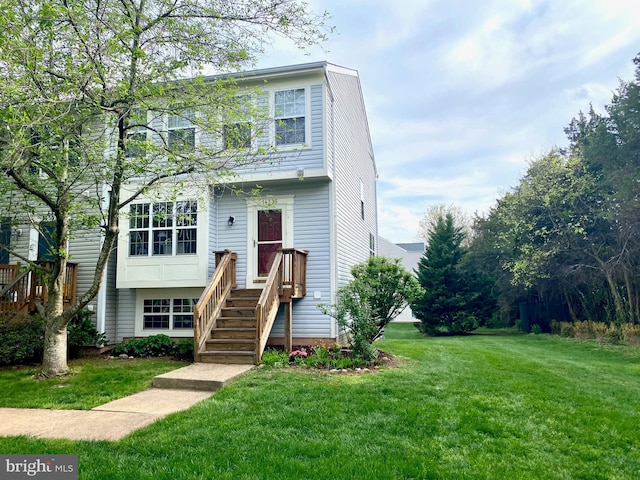 14335 Newbern Loop, Gainesville, VA 20155 - view of front of house with a front yard