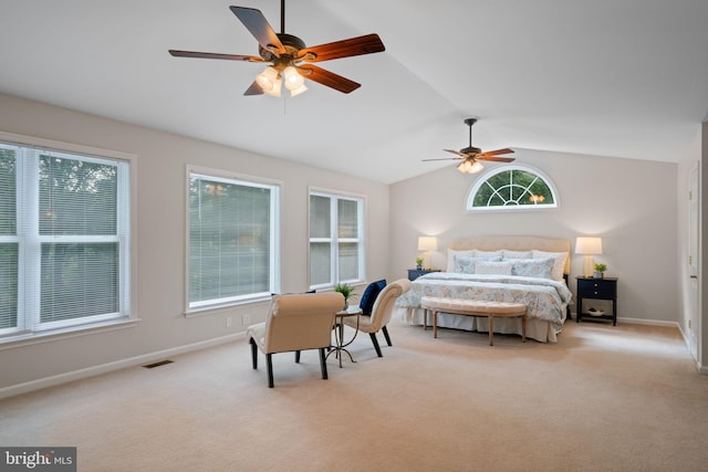 bedroom featuring visible vents, vaulted ceiling, carpet floors, a ceiling fan, and baseboards