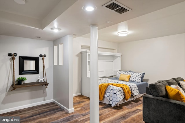 bedroom featuring baseboards, recessed lighting, dark wood finished floors, and visible vents