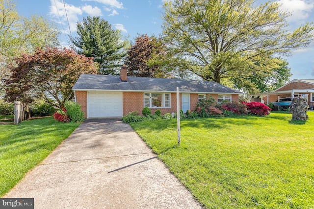 ranch-style house with driveway, brick siding, and a front yard