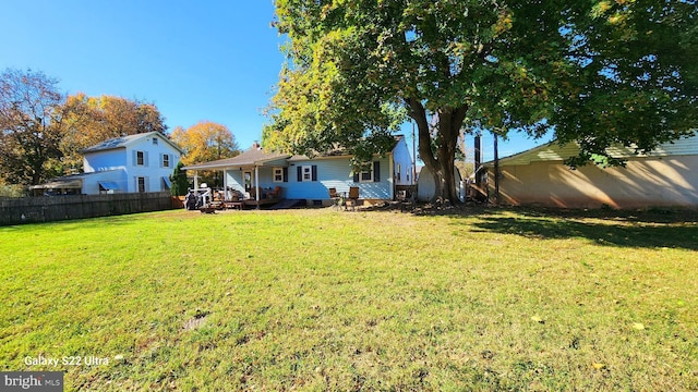 view of yard with fence