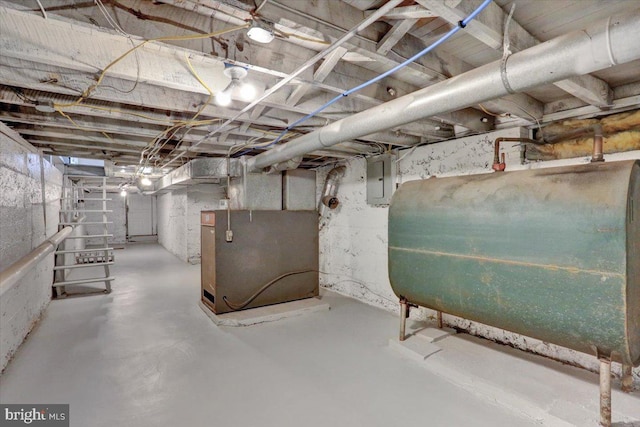 226 W Franklin St, Womelsdorf, PA 19567 - unfinished basement with heating unit, electric panel, and heating fuel