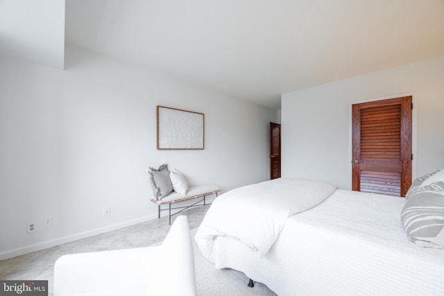 bedroom featuring baseboards