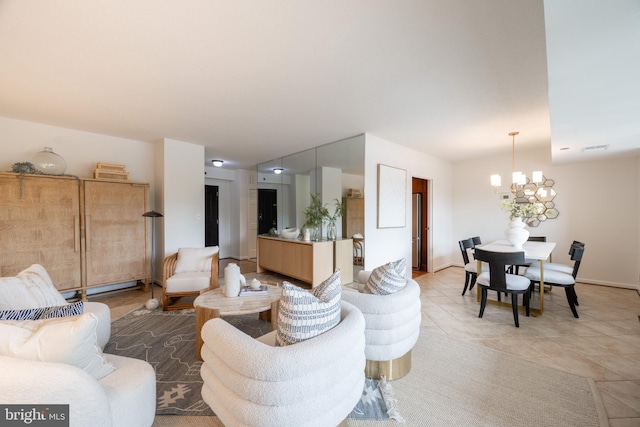 living room featuring a chandelier, baseboards, light tile patterned floors, and visible vents