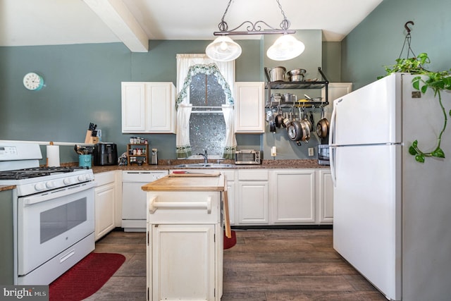 kitchen featuring dark wood finished floors, beam ceiling, white cabinets, and white appliances