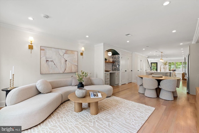 1708 10th St NW, Washington, DC 20001 - living area featuring crown molding, recessed lighting, and light wood finished floors