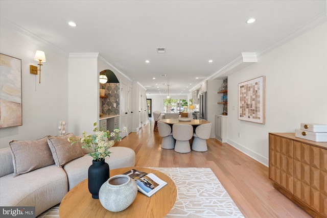 1708 10th St NW, Washington, DC 20001 - living area featuring recessed lighting, baseboards, ornamental molding, and light wood finished floors