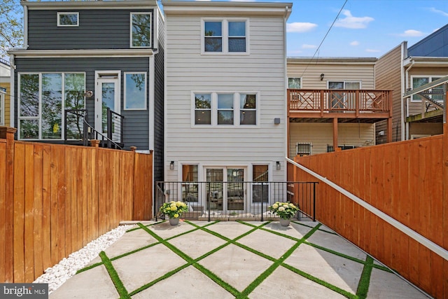 1708 10th St NW, Washington, DC 20001 - back of property featuring a fenced backyard and a patio area