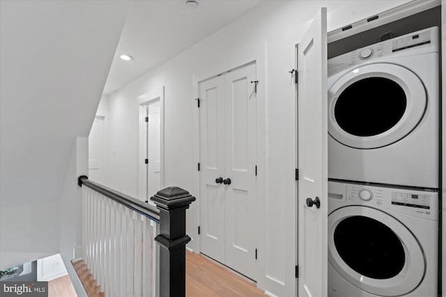 1708 10th St NW, Washington, DC 20001 - washroom featuring stacked washer and dryer, laundry area, recessed lighting, and light wood-style flooring