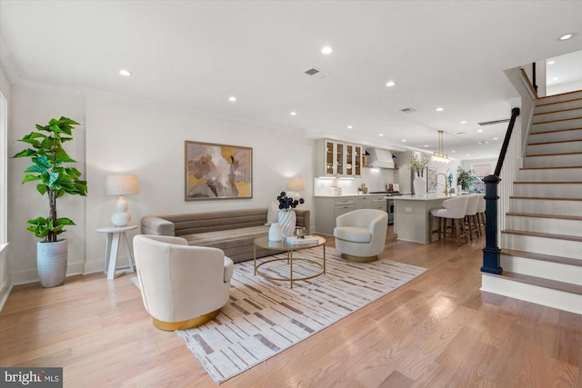 1708 10th St NW, Washington, DC 20001 - living room featuring recessed lighting, light wood finished floors, and stairs