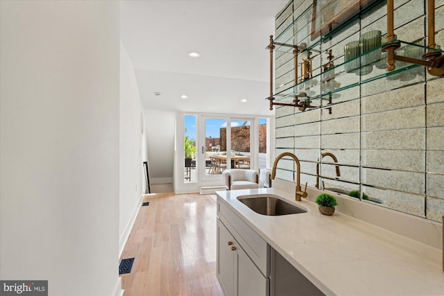 1708 10th St NW, Washington, DC 20001 - bar with a sink, recessed lighting, baseboards, and light wood finished floors