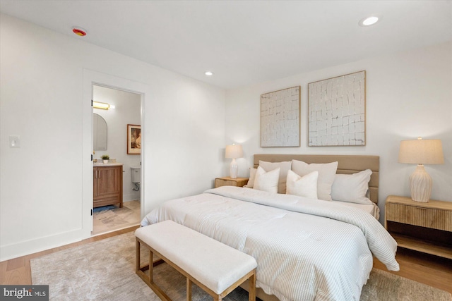 1708 10th St NW, Washington, DC 20001 - bedroom with recessed lighting, light wood-style flooring, ensuite bath, and baseboards